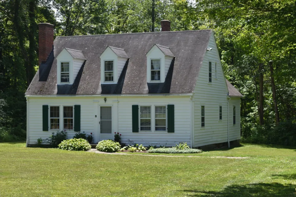Craftsman-style white kit home from Sears catalog sold in early 20th century